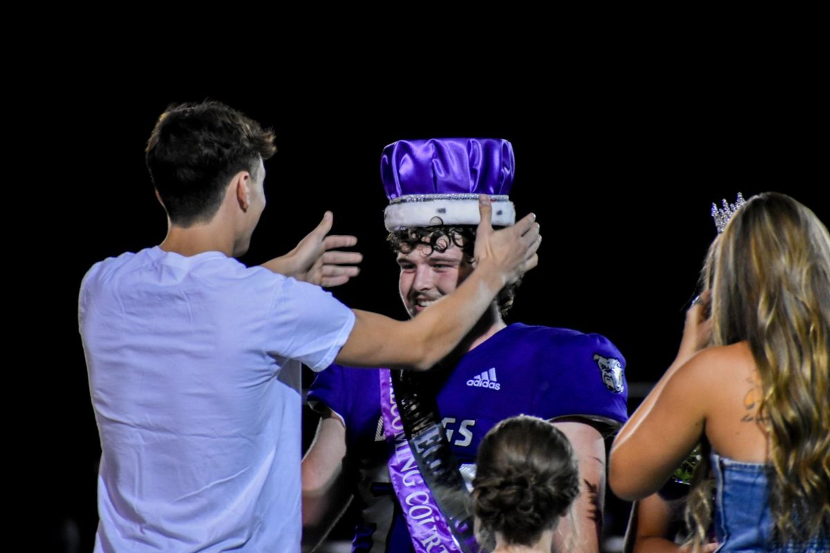 Hank Beard gets crowned Homecoming King.